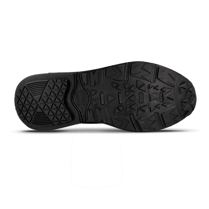 Black shoe sole with durable textured rubber, featuring intricate geometric patterns and deep multi-directional treads.