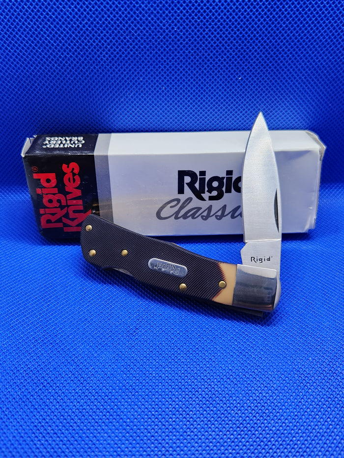 Rigid Knives Small Lockback Sawcut Delrin Handles 440 Brush Stainless Steel by United Cutlery Brands RG0809