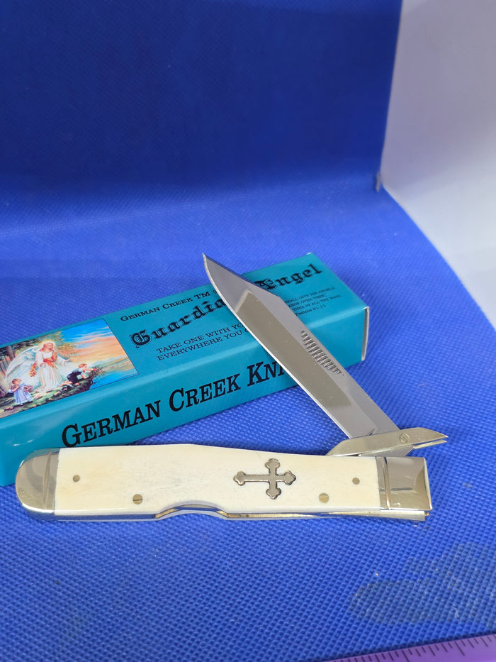 Guardian Angel Lock Back Cheetah Knife White Bone Handles 4 3/8" EM2567052WBN
