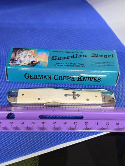 Guardian Angel Lock Back Cheetah Knife White Bone Handles 4 3/8" EM2567052WBN
