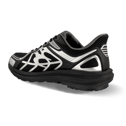 Black running shoe with a breathable mesh upper, silver reflective details, and a substantial black sole, seen from a rear-si