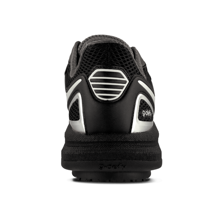 Black running shoe, back view, with silver accents on the heel and a textured sole. Features a mesh upper and g-defy logo.