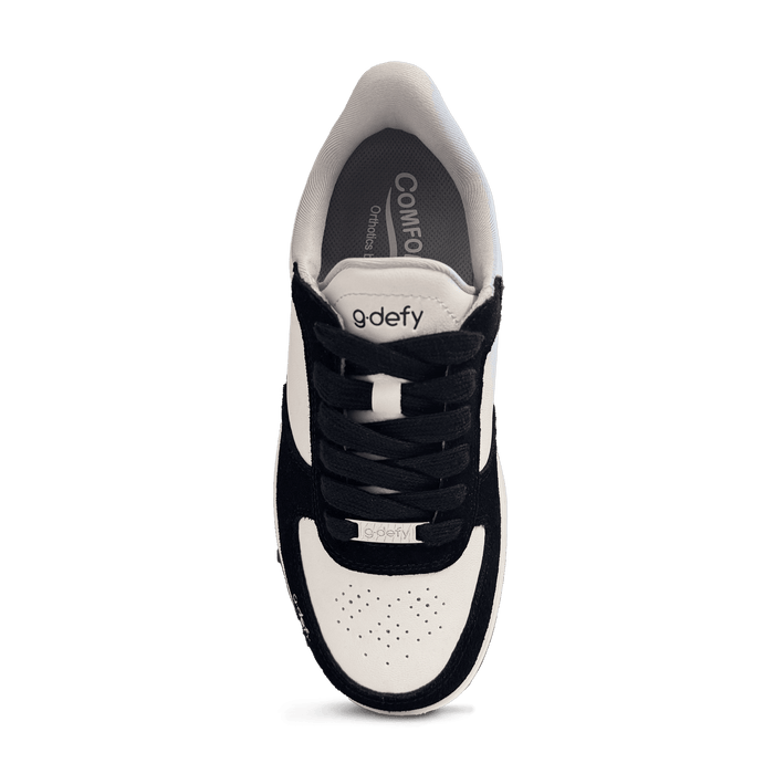 Black and white g-defy sneaker, top-down view, with black laces and "COMFORT Orthotics" insole.