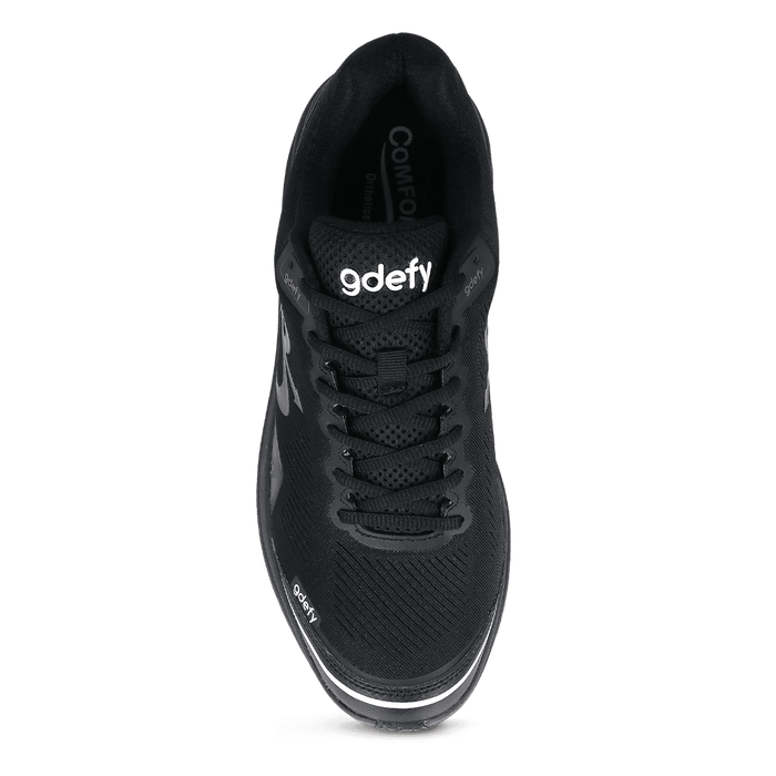 Black gdefy running shoe, top-down view, with black laces and white branding on the tongue and side.