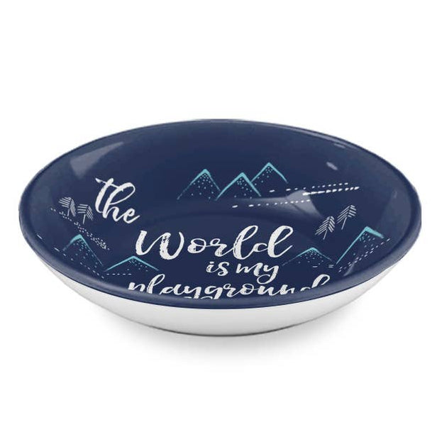 A round shallow bowl with a dark navy blue interior featuring the phrase 'the World is my playground' in white script, decorated with white and light blue mountain illustrations. The exterior of the bowl is white, shown against a plain white background.